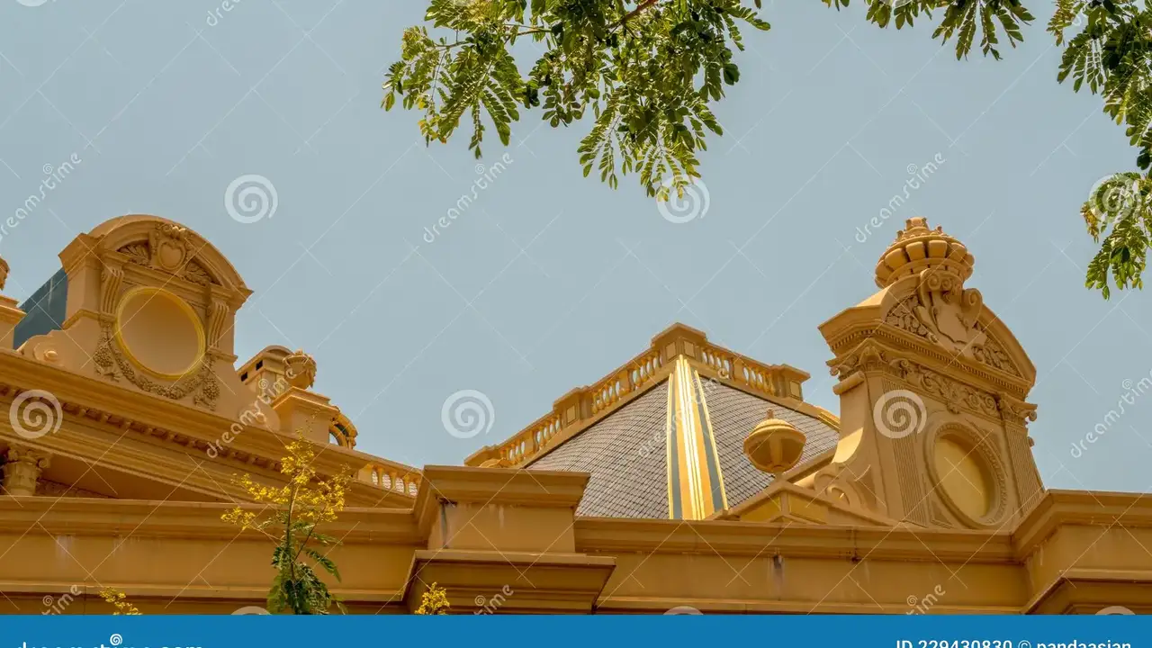 Two mint chocolate milkshakes with whipped cream and green sprinkles.