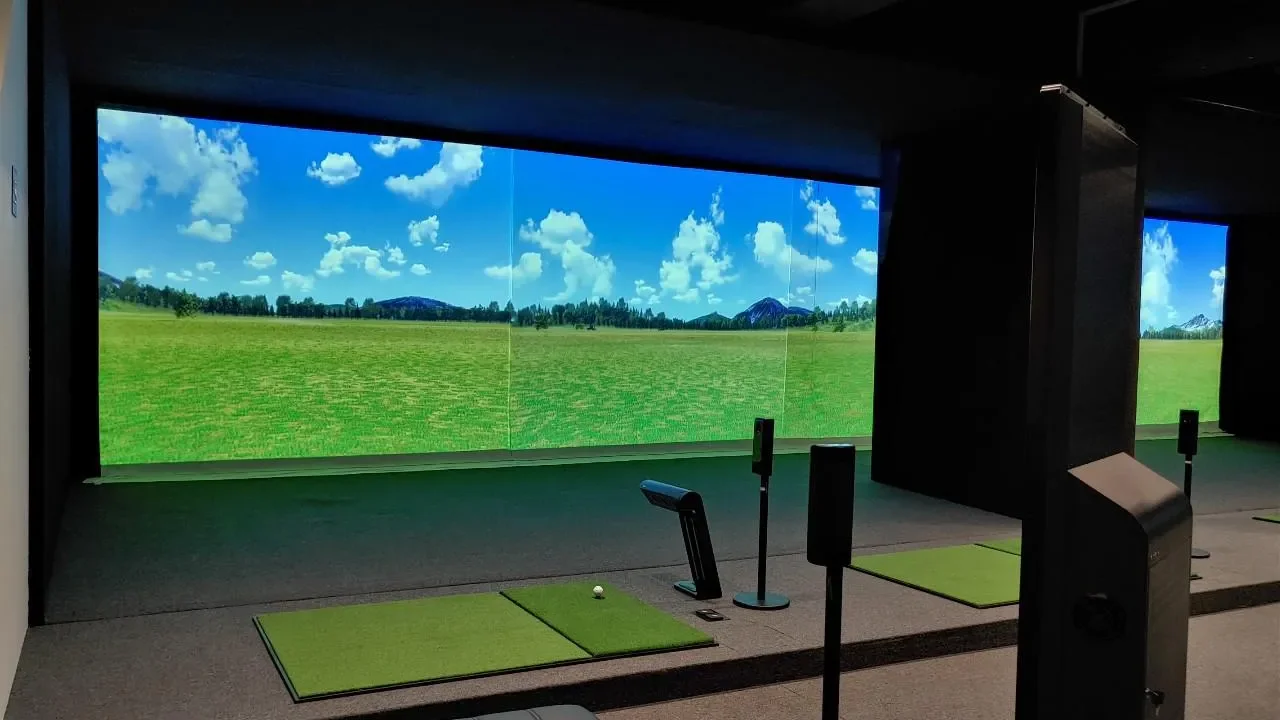 Close up on a plate of mashed potatoes, topped with baked pork chops with cream of mushroom soup, and a side of green beans.